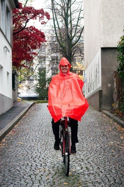 Regenpelerine mit Kapuze Damen & Herren orange